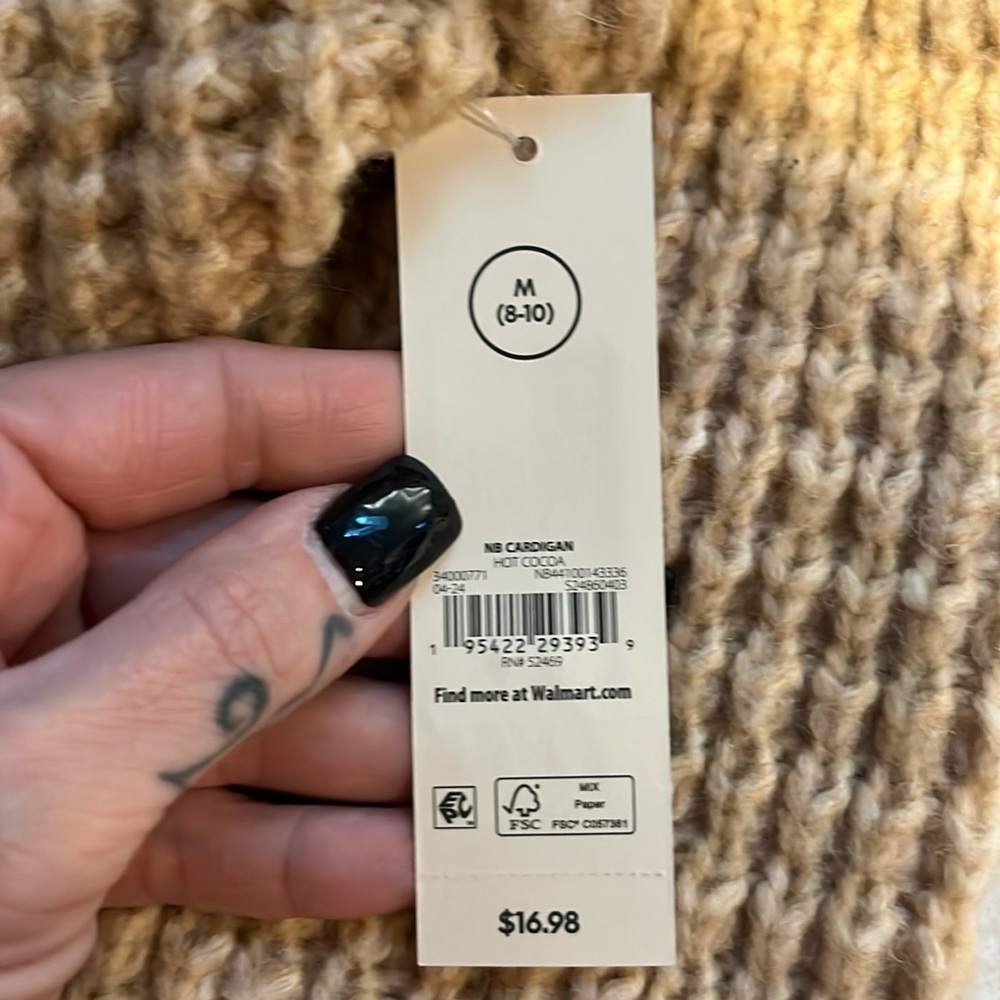 Brand new with tags cream colored short cardigan